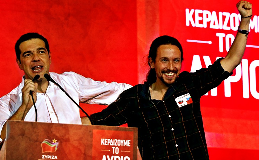 Image of two leaders of Syriza on stage