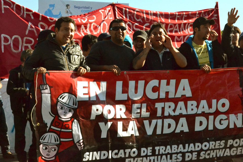 Port workers in Chile march with banner