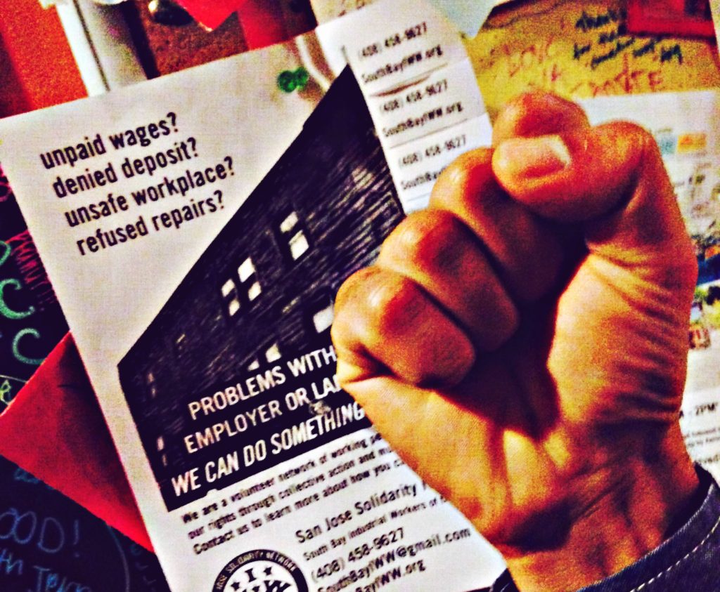 Solidarity network flyer with fist in front