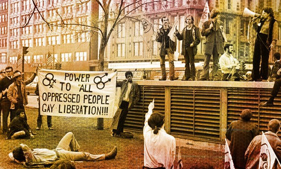 1970s era photo of gay rights activists demonstrating. Speaker and banner. 