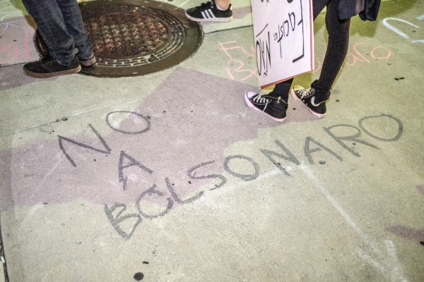 Chalk on sidewalk: No a Bolsonaro.